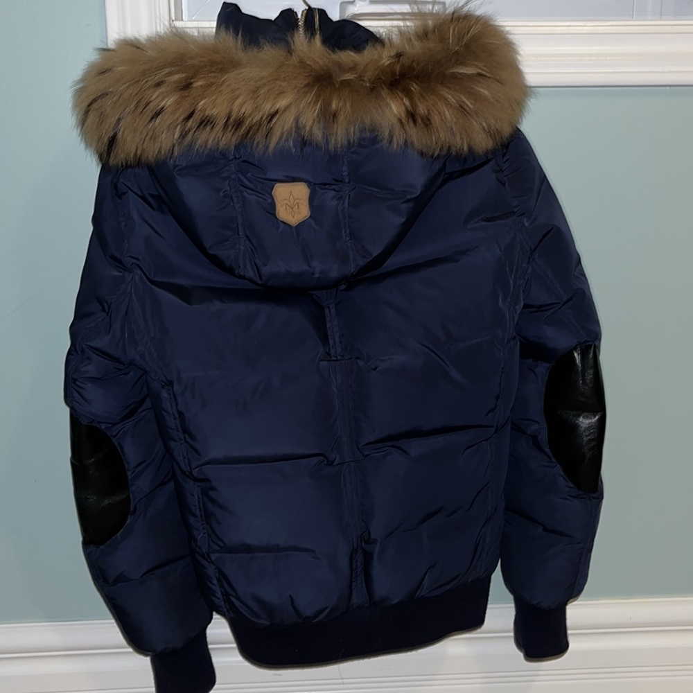 Mackage jacket with leather elbow patches, down filled.